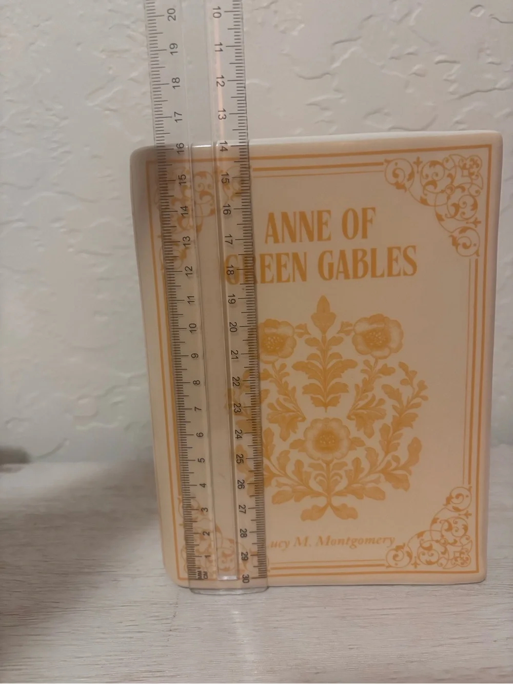 Anne of Green Gables book vase. ceramic book vase with vertical ribbed texture.